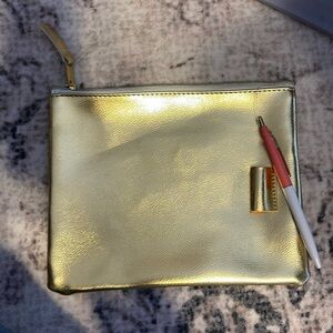 Gold pouch with pen